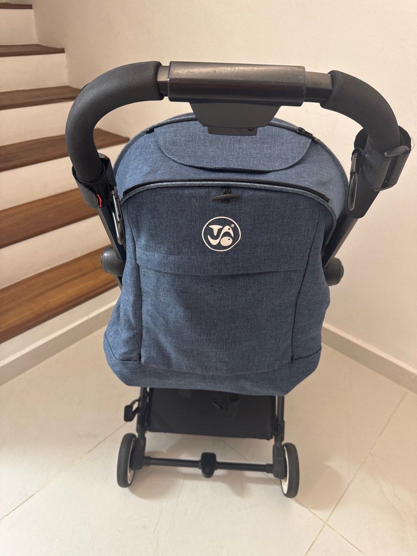 Basic Gadget Stroller (Category: Strollers) located in Kuala Lumpur. Submitted by ttee35 (Listing ID 1413110602, Image 2). Description: - Navy blue stroller - Compact and travel-friendly design - Includes sunshade - Features a safety harness - Easy-maneuvering handle - Lightweight - Branded.