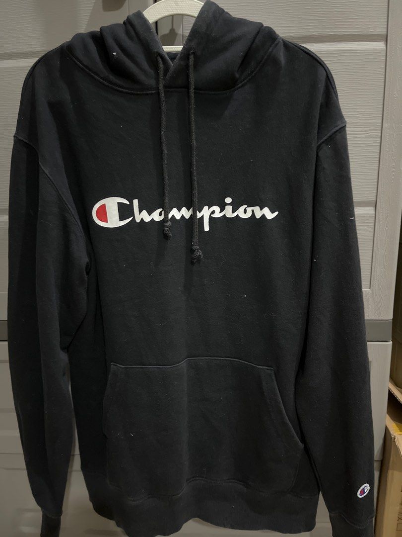 Champion Hoodie - Black - Large (Category: Hoodies) located in Valenzuela. Submitted by gengen13 (Listing ID 1413183127, Image 1). Description: - Black Champion hoodie - Size: Large - Made in USA - Champion logo on front and left sleeve - Hood with drawstrings - Kangaroo pocket Dimes L 27.5 W 21.5 - color rating 9.5/10 With signs of usage Pls manage ur expecation. Preloved item Pm for more details.