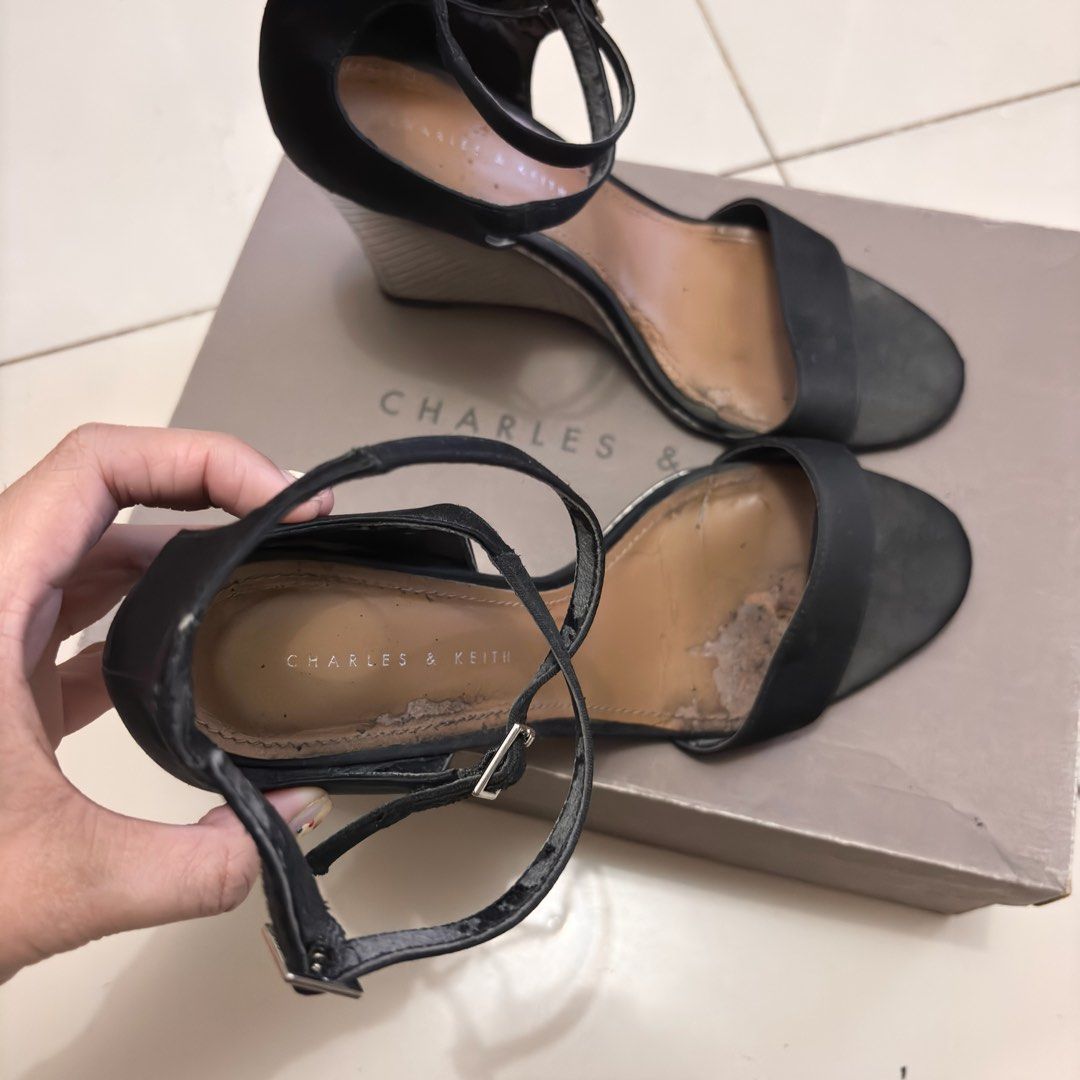 CHARLES & KEITH Black Heels (Metallic Wedges) (Category: Heels) located in Manila. Submitted by erlaien.ph (Listing ID 1413174651, Image 3). Description: 🏷 BUY NOW: great for events! orig price at ₱2,399 - i’ll clean it once purchased - Wedges (4” heel) - Ankle strap with buckle closure - Includes original box 🛒 Payment method: GCASH 📦 Shipping: LALAMOVE or J&T PM ME FOR MORE INQUIRIES 💌 Check out my profile for other great offers & nice stuf