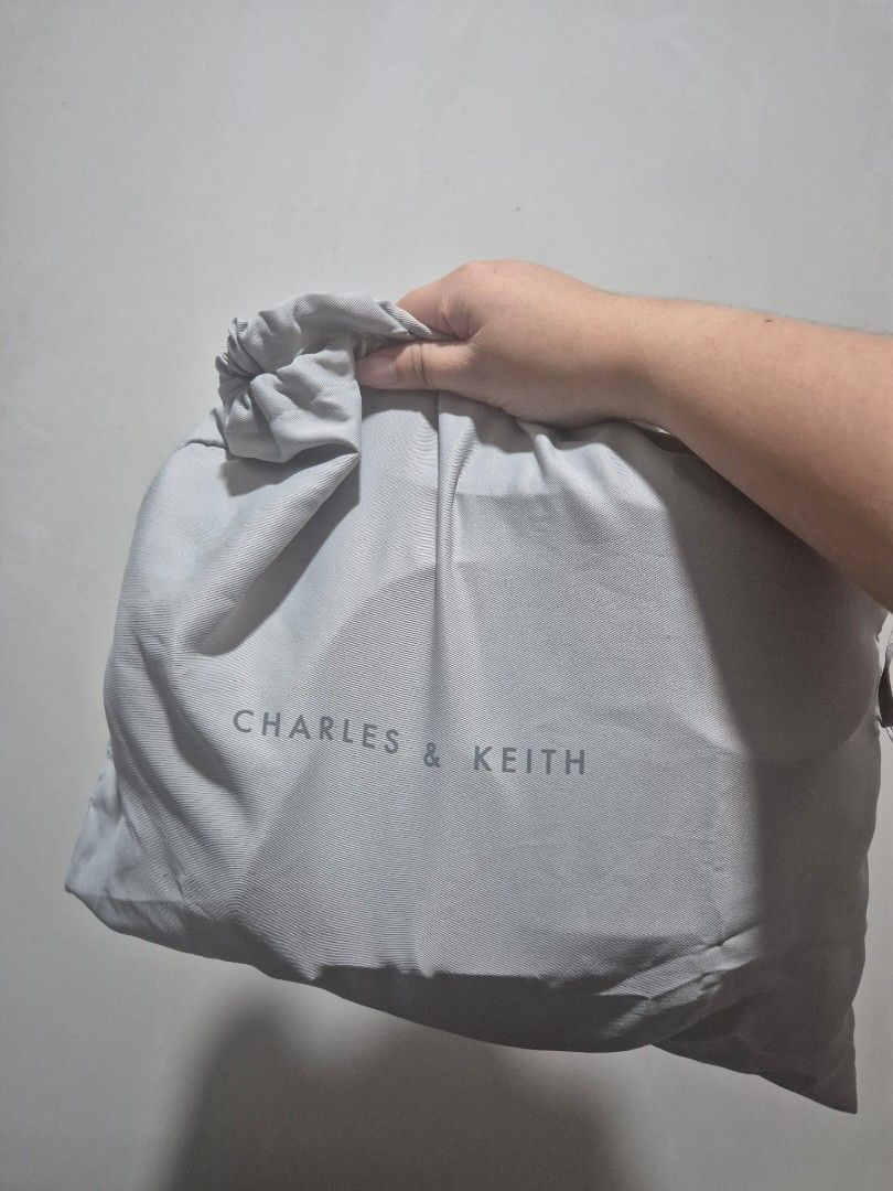 Charles & Keith Gabine Saddle Bag (Oat) (Category: Luxury Bags & Wallets) located in Cainta. Submitted by jamdgu (Listing ID 1413137981, Image 3). Description: Charles & Keith Gabine Saddle Bag in Oat Bought from Singapore Rarely used In excellent condition, with pouch MOP: Maya, GCash, BPI, UnionBank, GoTyme Delivery: J&T, Lalamove Loc: Cainta.