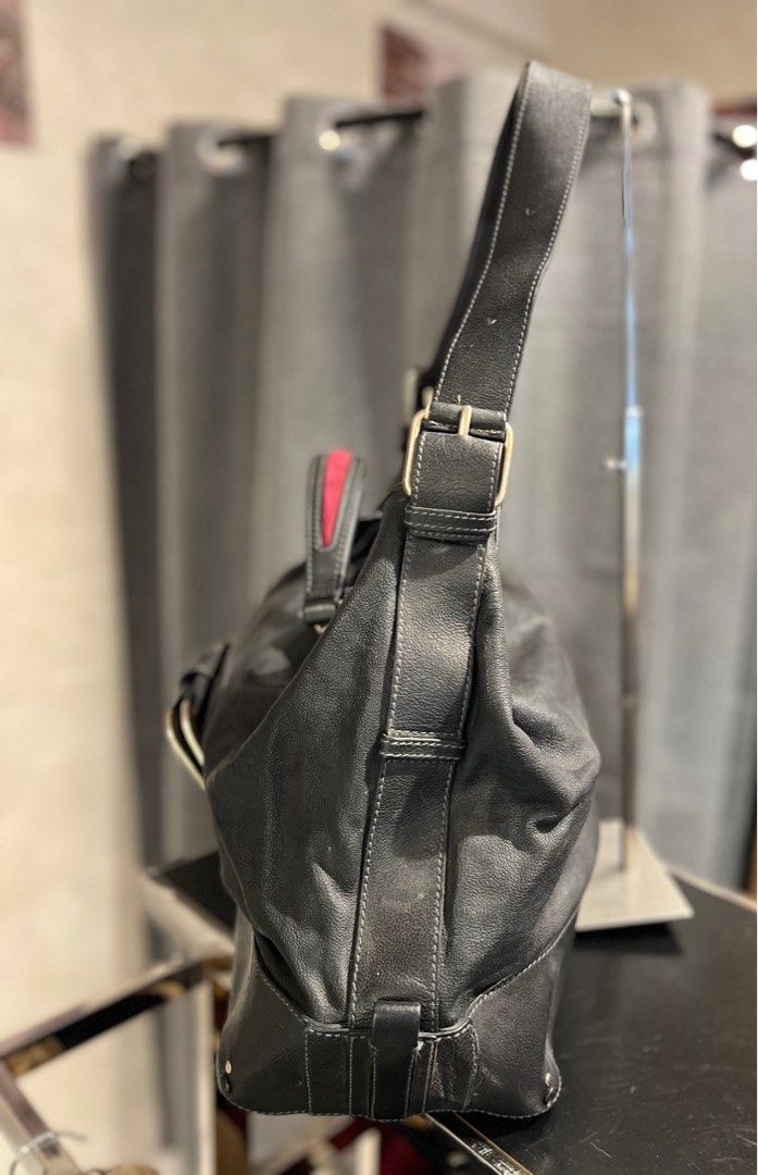 Chloe Vintage Hampton Top hand Bag (Category: Luxury Bags & Wallets) located in Manila. Submitted by -handpick- (Listing ID 1413061853, Image 3). Description: - Chloe shoulder bag - Black leather - Top handle and detachable shoulder strap - Interior zippered pocket - Unique front flap closure with metal frame - Black fabric lining - "Chloe" embossed inside - Made in Italy -Sign of usage.