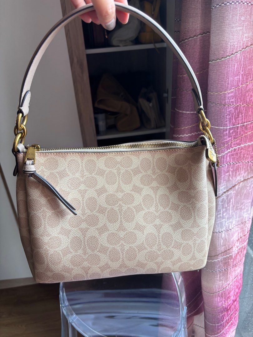 Coach Shay Shoulder Bag (Category: Luxury Bags & Wallets) located in Las Pinas. Submitted by itskat.cruz (Listing ID 1413072538, Image 1). Description: - Authentic Coach Shay shoulder bag - Signature canvas in monogram pattern - Top handle and detachable strap - Burgundy fabric lining - Includes dust bag.