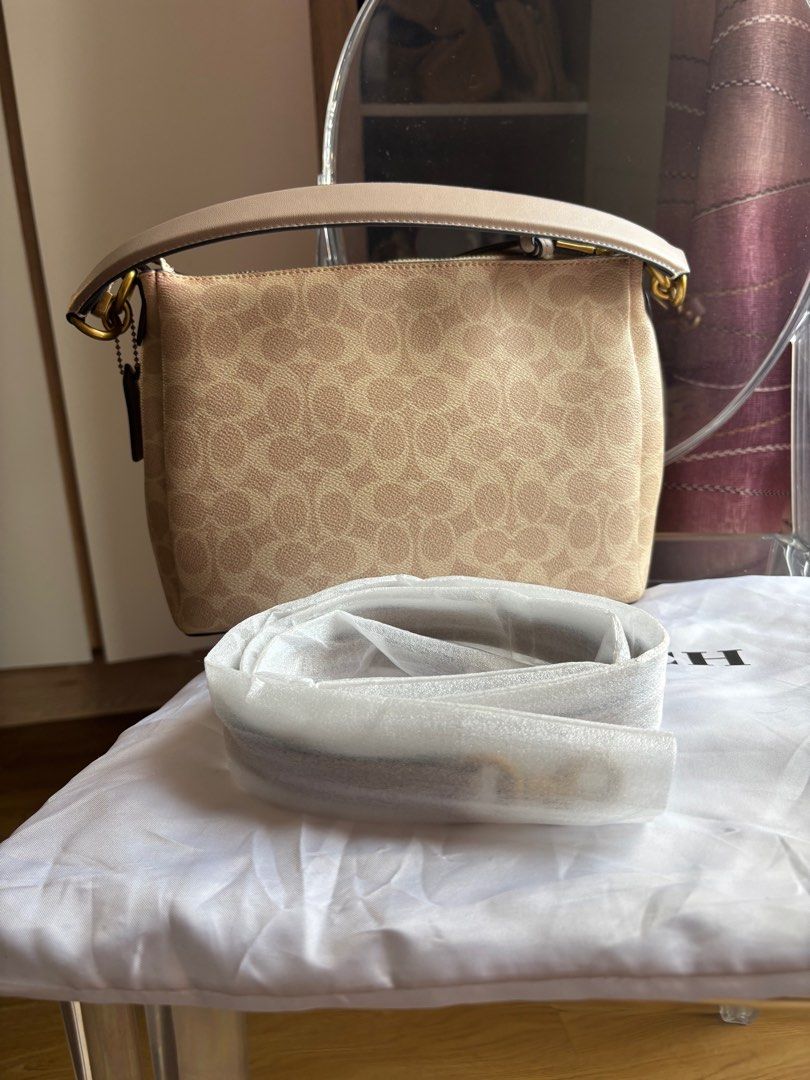 Coach Shay Shoulder Bag (Category: Luxury Bags & Wallets) located in Las Pinas. Submitted by itskat.cruz (Listing ID 1413072538, Image 2). Description: - Authentic Coach Shay shoulder bag - Signature canvas in monogram pattern - Top handle and detachable strap - Burgundy fabric lining - Includes dust bag.