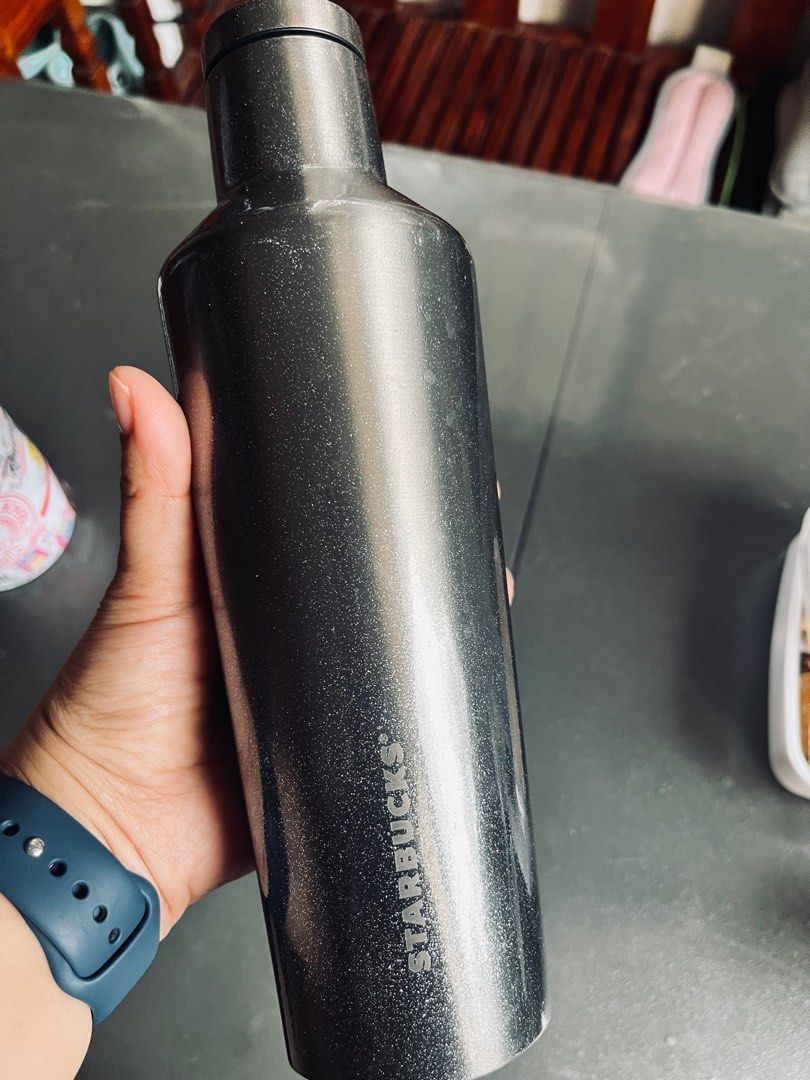 Corkcicle x Starbucks Tumbler (Category: Water Bottles & Tumblers) located in Manila. Submitted by royaljaydee (Listing ID 1413057231, Image 2). Description: - Starbucks x Corkcicle collaboration - Stylish metallic glittery finish - 16 fl oz / 473ml (473ml) capacity - Features a cap with the same metallic glittery finish - Starbucks logo present - Used for coffee onlu Rfs: received a new tumbler for xmas.