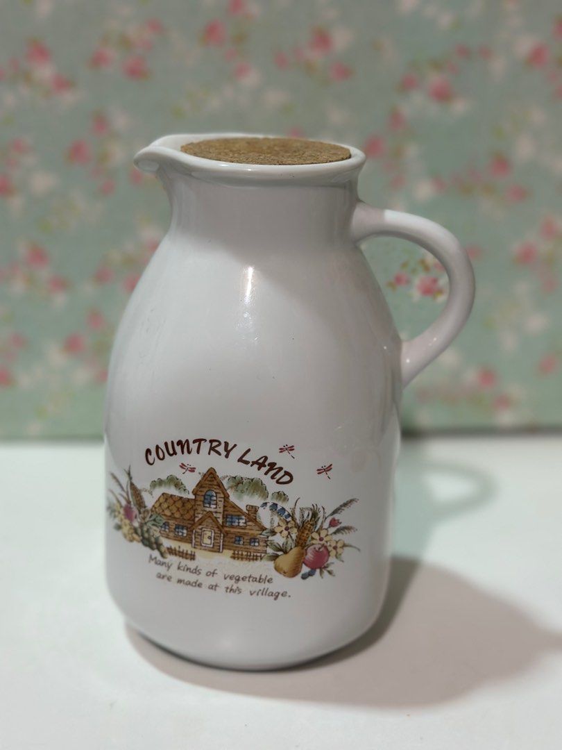 Country Land Ceramic Pitcher with Cork Lid (Category: Pitchers & Dispensers) located in Davao. Submitted by favoritepreloved (Listing ID 1413201876, Image 1). Description: ❤️ 16cm height.
