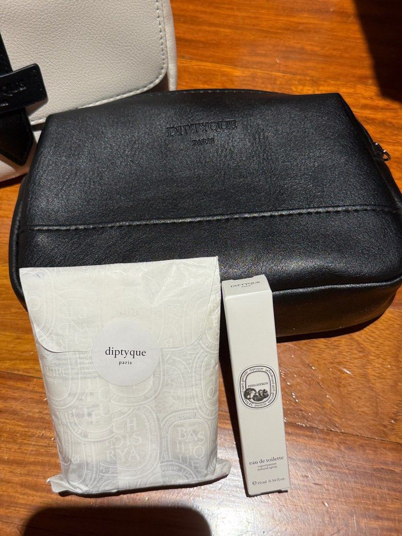 Diptyque set (Category: Fragrance & Deodorants) located in Mandaluyong City. Submitted by msgz08 (Listing ID 1413195282, Image 3). Description: White pouch - 7pcs available inclusions: Doson 10ml body lotion lip balm face lotion Black pouch - 1 pc inclusions: Philosykos 10ml body lotion lip balm face lotion .