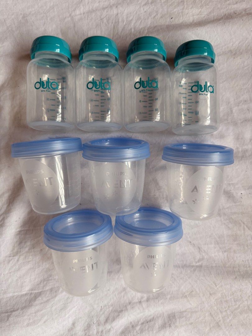 Dula and Philips Avent Breast Milk Storage Containers (Category: Breastfeeding & Bottle Feeding) located in Manila. Submitted by brill.corner (Listing ID 1413203795, Image 1). Description: Selling as a bundle: 1️⃣ Dula Standard Neck Breastmilk Storage Bottles – 5oz (4pcs) Lightly used Bought for ₱295 2️⃣ Philips AVENT Breast Milk Storage Cups & Lids – 5-pack Only 2 used lightly Bought for ₱403 All items are in excellent condition and clean. Pleas