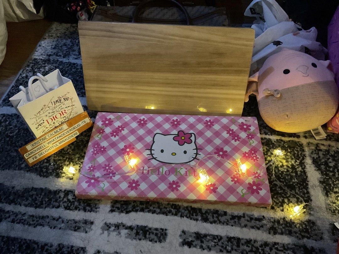 Hello Kitty Box with Lights (Category: Craft Supplies & Tools) located in San Pedro. Submitted by whatandeverdelights (Listing ID 1413209361, Image 1). Description: - Kitty box with a charming design. - Features a pink and white checkered pattern. - wooden chopping board.
