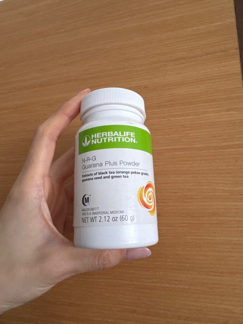 Herbalife N-R-G Guarana Plus Powder (Category: Sports & Fitness Nutrition) located in Singapore. Submitted by roses (Listing ID 1413048497, Image 1). Description: - Herbalife N-R-G Guarana Plus Powder (Malaysia stock) - Contains black tea, guarana seed, and green tea extracts - Net weight: 60g - Expiry date: 10/07/2026 - Traditionally used for fatigue relief - Directions: Mix 1 scoop with water - Please consult your doctor if symptoms persist Tra