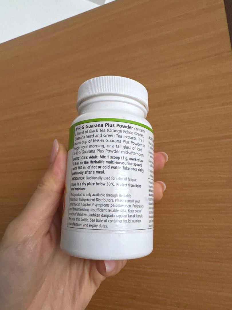Herbalife N-R-G Guarana Plus Powder (Category: Sports & Fitness Nutrition) located in Singapore. Submitted by roses (Listing ID 1413048497, Image 2). Description: - Herbalife N-R-G Guarana Plus Powder (Malaysia stock) - Contains black tea, guarana seed, and green tea extracts - Net weight: 60g - Expiry date: 10/07/2026 - Traditionally used for fatigue relief - Directions: Mix 1 scoop with water - Please consult your doctor if symptoms persist Tra