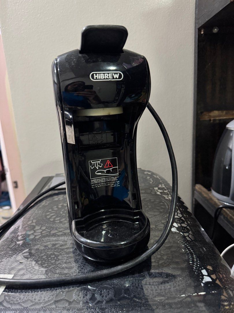 hi brew coffee maker (Category: Coffee Machines & Makers) located in Quezon City. Submitted by dk1995 (Listing ID 1413143004, Image 2). Description: With crack on water tank but still works fine; with adaptor for ground coffee.
