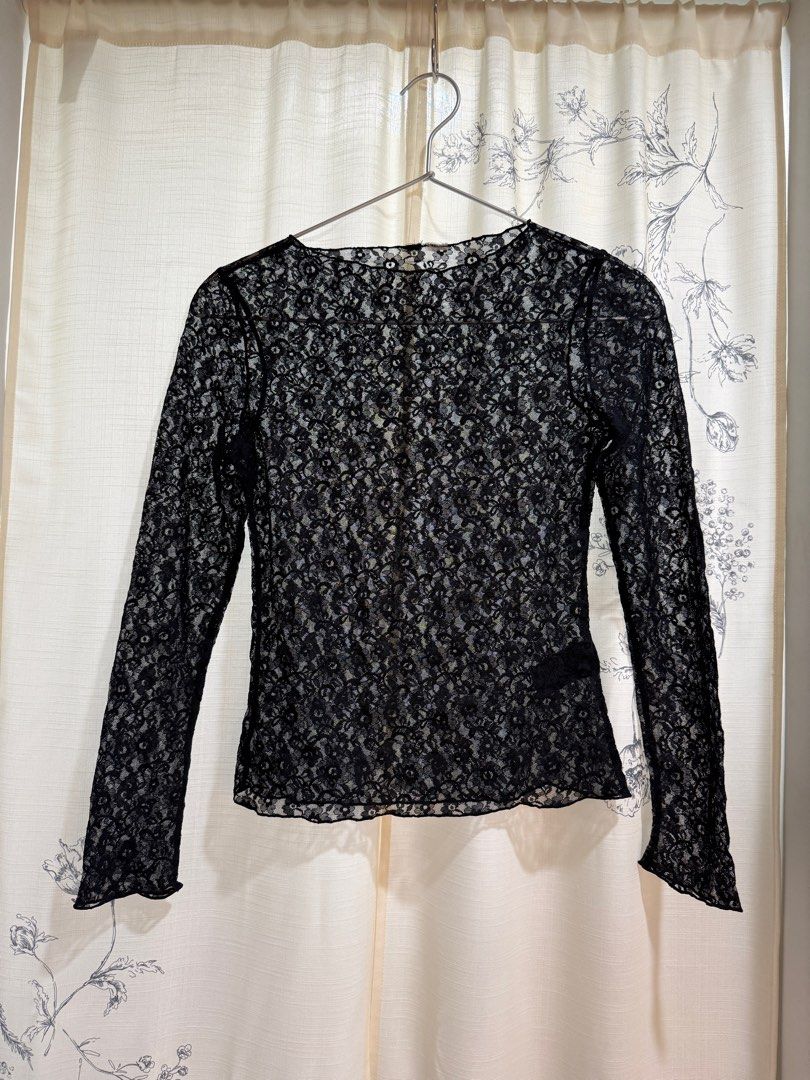 H&M Black Lace Long Sleeve Top (Category: Longsleeves) located in Quezon City. Submitted by maplehome (Listing ID 1413091827, Image 1). Description: - Black lace top - Long sleeves - Round neckline - Fitted silhouette - Perfect for layering - Sophisticated lace design - Suitable for casual and dressy wear Personally cutout back neck tag. Used this only once.