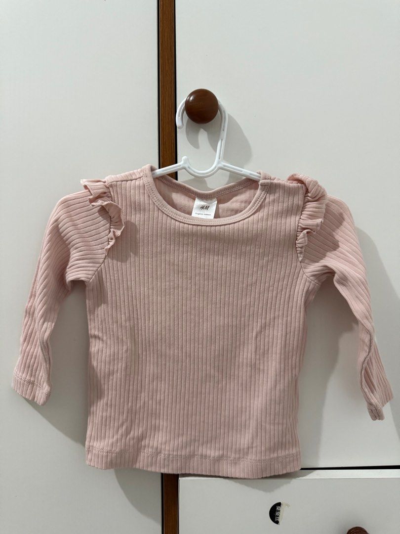H&M Ribbed Top and Leggings Set (Category: Babies & Kids Fashion) located in Manila. Submitted by cynth25 (Listing ID 1413118955, Image 1). Description: - H&M baby set - Size: 6-9M - Color: Soft pink - Includes: Ribbed long-sleeved top with ruffle details & matching ribbed leggings - Top features a round neckline - Material: Organic cotton.