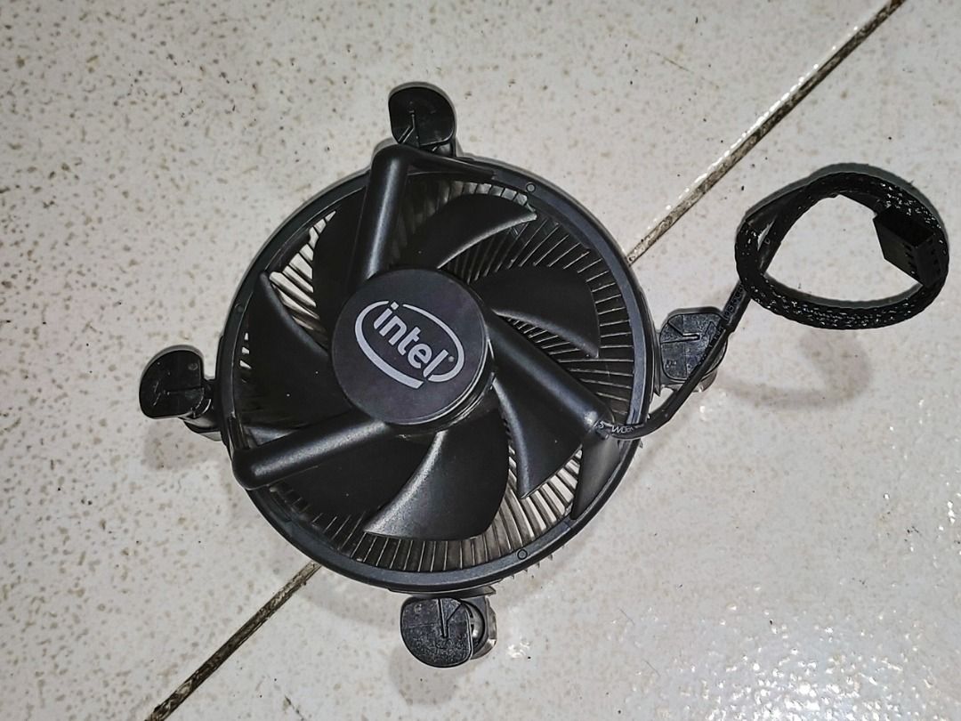 intel 11th Gen i7 Heatsink and Fan Black with Solid Copper Base (Category: Computer Parts) located in Paranaque City. Submitted by marvin.cavalida (Listing ID 1413174008, Image 1). Description: - Intel 11th Gen Stock CPU cooler - Copper base - Features a black fan with the Intel logo - Anodized Black body - Four-pin power connector with PWM - Easy clip-on installation - Designed for standard Intel sockets LGA 1200, 1150, 1151, 1155, 1156 - Barely