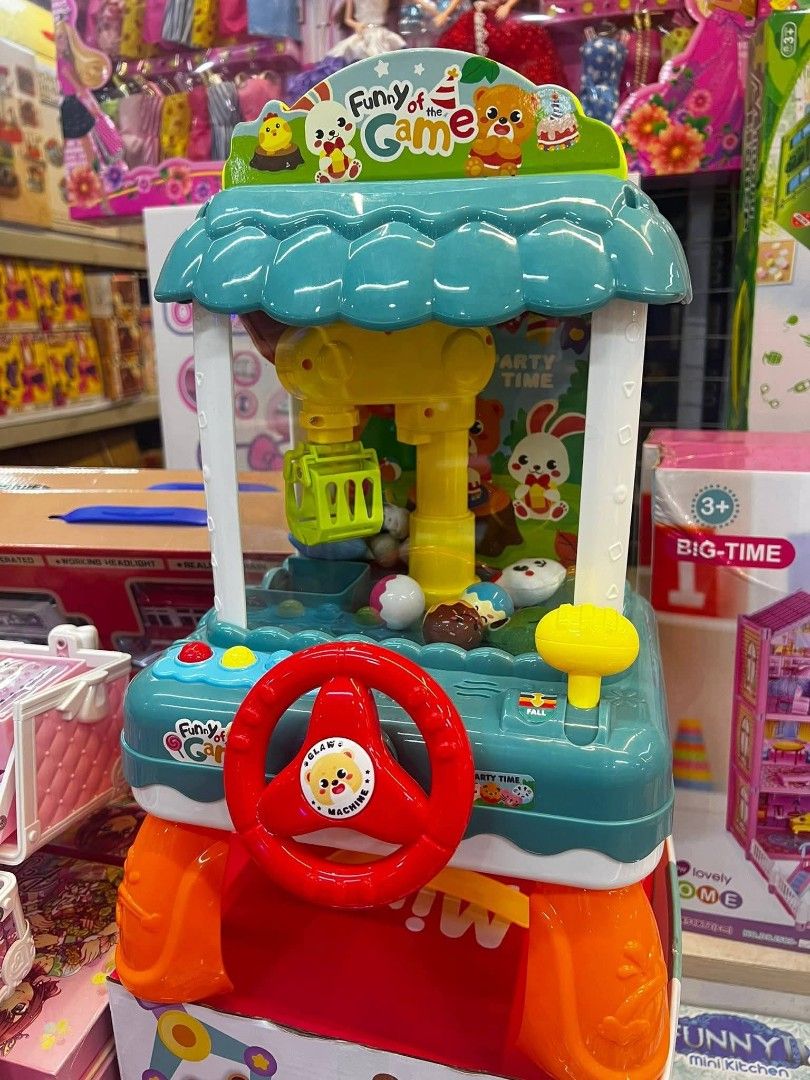 Jiaerle Toys Mini Doll Catcher (Category: Kids Toys) located in Manila. Submitted by rocillocin64338 (Listing ID 1413114938, Image 1). Description: - Jiaerle Toys Mini Doll Catcher - Mechanical claw, music, and lights - Includes toys and USB power wire - Steering wheel and control lever - Easy to play: Load balls and dolls, transfer to exit - Plays applause and cheers when you win - Suitable for ages 3+.