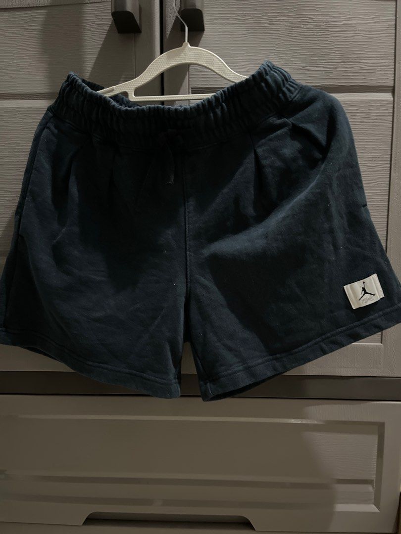 Jordan Loose Fit Shorts (Category: Shorts) located in Valenzuela. Submitted by gengen13 (Listing ID 1413188229, Image 1). Description: - Dark blue Jordan shorts - Features the iconic Jordan logo - Elastic waistband with drawstring for a comfortable fit - Loose fit design - Made in China No visible issue Preloved item. Pls manage ur expecation Dimes : W 13 L 15 Pls pm for more details.