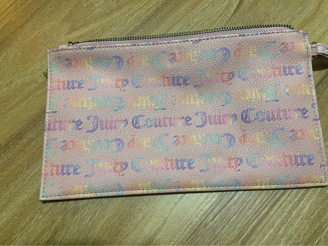 Juicy Couture Wallet Clutch (Category: Clutches) located in Pasig City. Submitted by mbtra (Listing ID 1413141805, Image 2). Description: brand new, never used (no original packaging) ORIGINAL JUICY COUTURE.