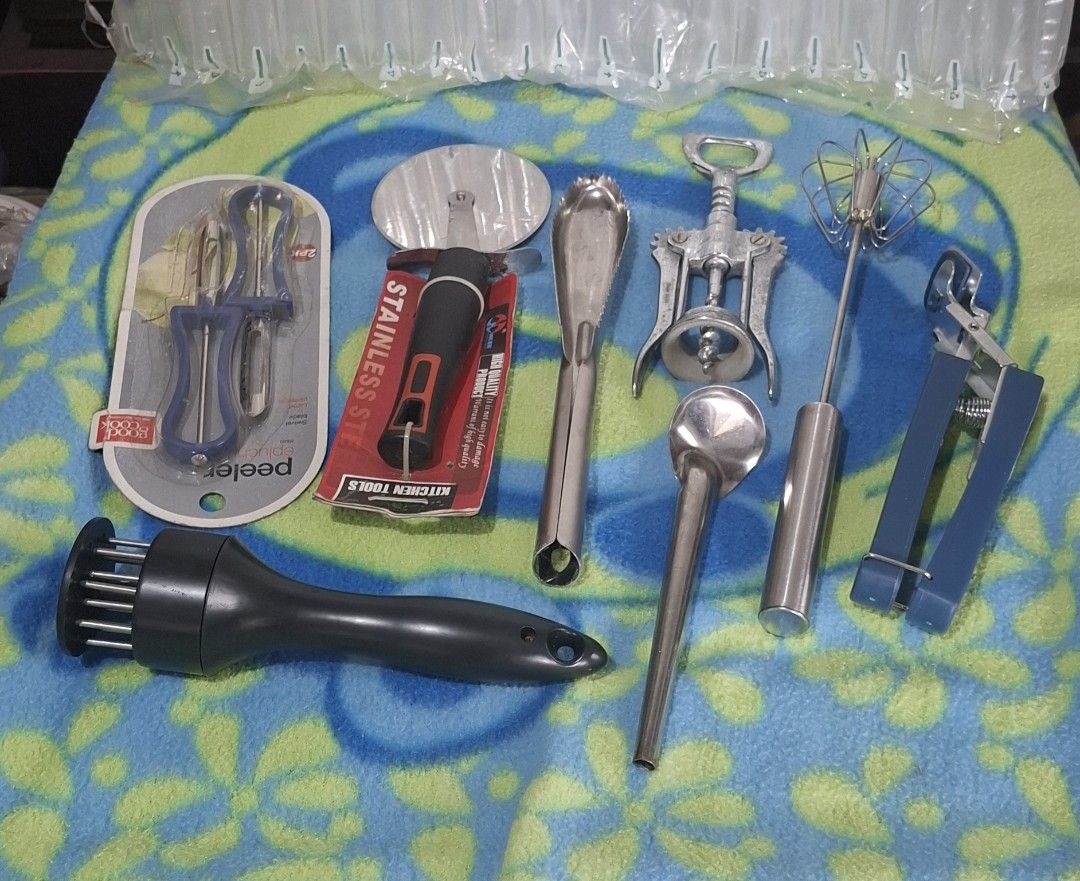 Kitchenware Bundle (Category: Cookware & Accessories) located in Bulacan. Submitted by gjeen (Listing ID 1413067852, Image 1). Description: 1 peeler 1 pizza cutter 1 fish scale remover 1 champagne opener 1 egg beater 1 tenderizer 1 pot holder 1 coconut spoon.
