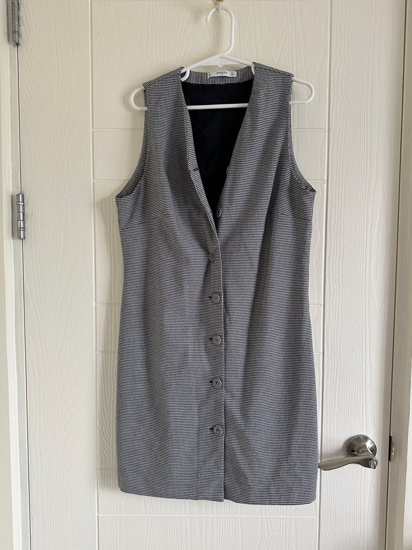 Mango Suit Sleeveless Black Dress (Category: Dresses) located in Pasig City. Submitted by styledbynice (Listing ID 1413104610, Image 1). Description: - Mango Suit sleeveless dress - Houndstooth pattern - Button-down front - V-neckline - Fully lined - Size: L - Made in Turkey.