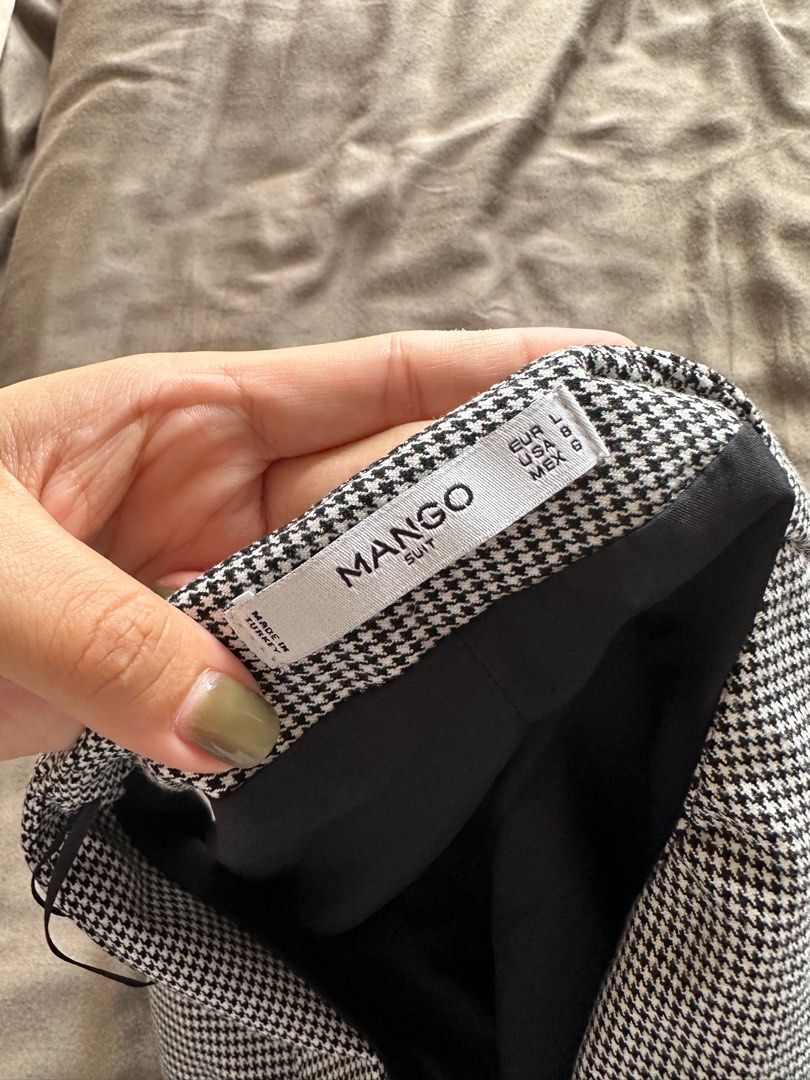 Mango Suit Sleeveless Black Dress (Category: Dresses) located in Pasig City. Submitted by styledbynice (Listing ID 1413104610, Image 2). Description: - Mango Suit sleeveless dress - Houndstooth pattern - Button-down front - V-neckline - Fully lined - Size: L - Made in Turkey.