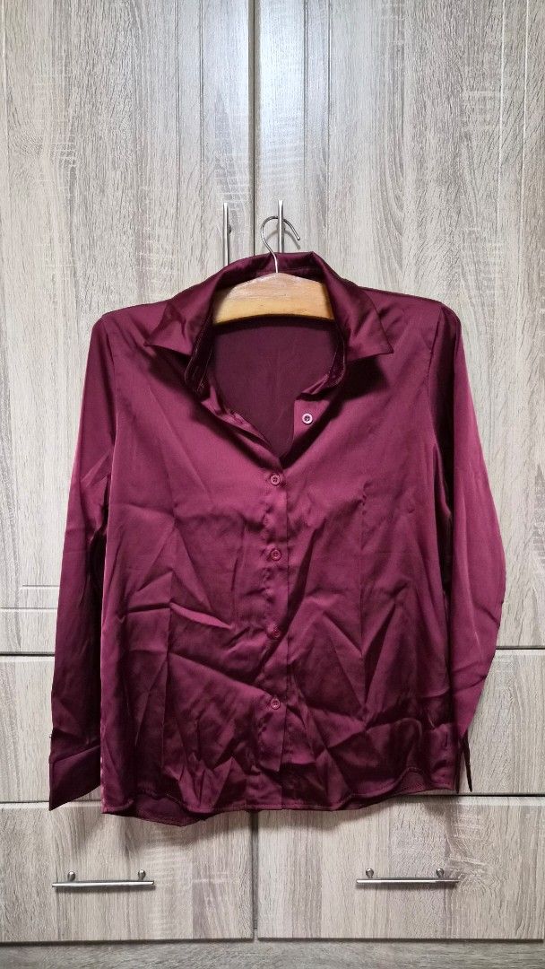 Maroon Long Sleeve Shirt (Category: Tshirts & Polo Shirts ) located in Bulacan. Submitted by getclaud (Listing ID 1413144167, Image 1). Description: Button down long sleeve polo Maroon Twice used Fabric is satin Bought from Tiktok Med on tag - fits small-semi large P100.00.