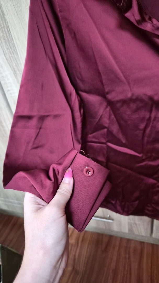 Maroon Long Sleeve Shirt (Category: Tshirts & Polo Shirts ) located in Bulacan. Submitted by getclaud (Listing ID 1413144167, Image 2). Description: Button down long sleeve polo Maroon Twice used Fabric is satin Bought from Tiktok Med on tag - fits small-semi large P100.00.