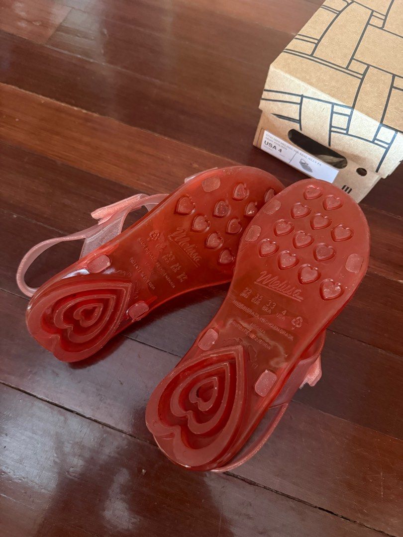 Melissa Sandals - Pink (Category: Babies & Kids Fashion) located in Cebu City. Submitted by jad088 (Listing ID 1413067242, Image 2). Description: - Pink Melissa sandals - Transparent strap design - Comes with original box - Heart-shaped sole pattern - Size USA 4.