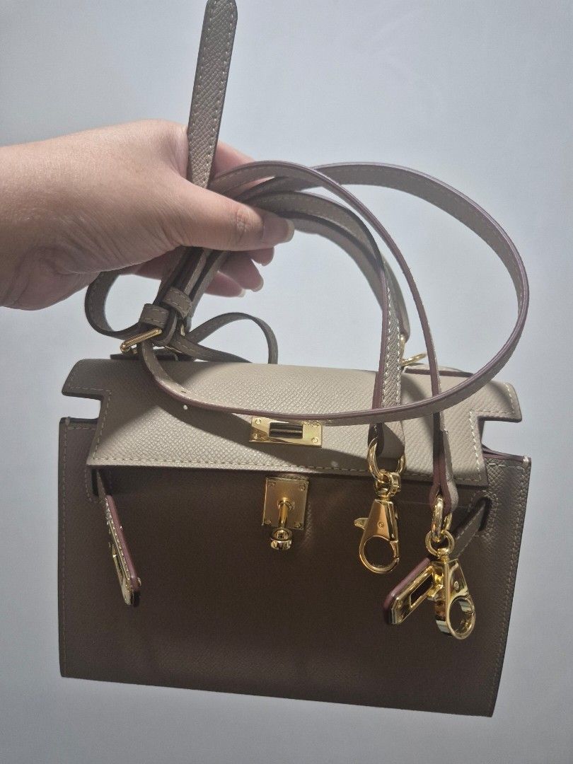 Mini Handbag with Shoulder Strap (Category: Shoulder Bags) located in Cainta. Submitted by jamdgu (Listing ID 1413094012, Image 3). Description: Includes pouch and box MOP: Maya, GCash, BPI, UnionBank, GoTyme Delivery: J&T, Lalamove Loc: Cainta.