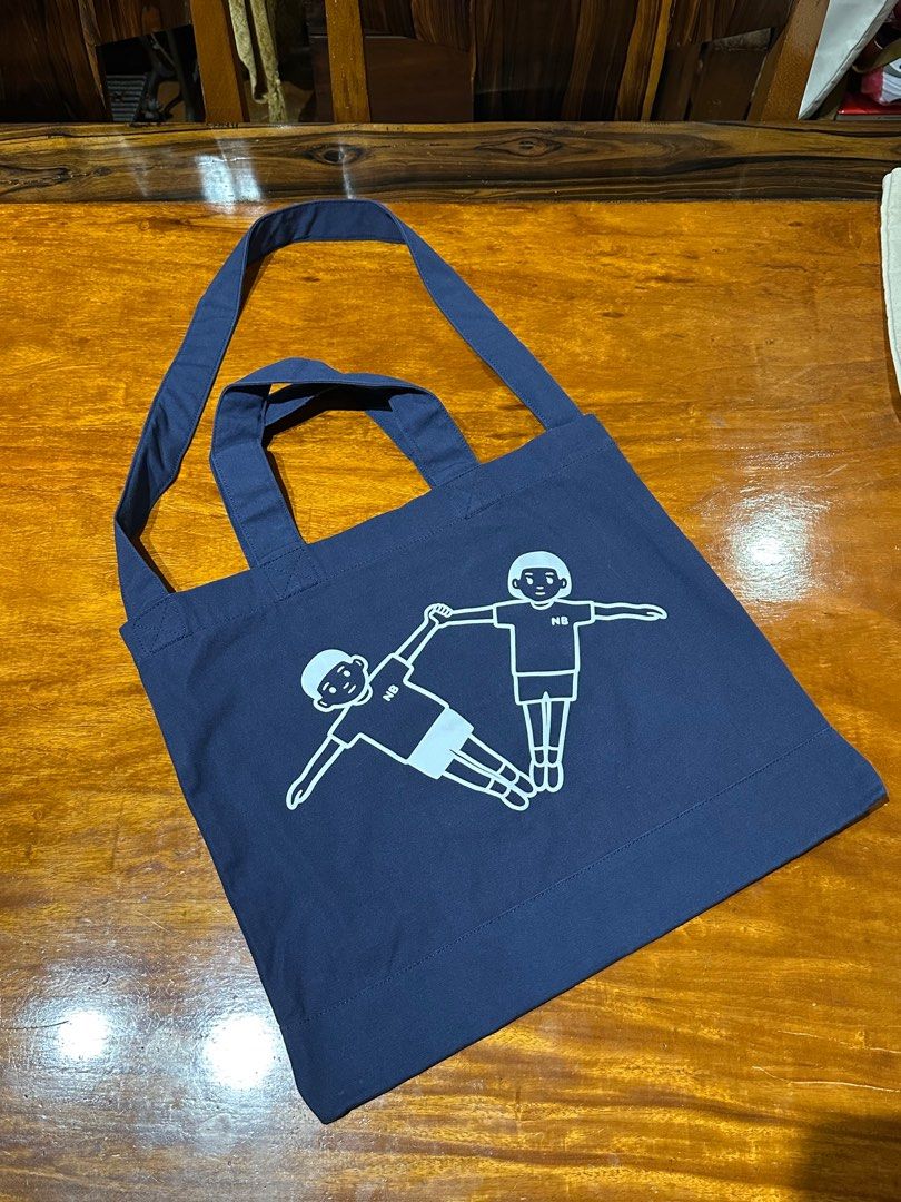 New Balance 2-way tote bag (Category: Tote Bags) located in Angeles City. Submitted by mmolinaaaa (Listing ID 1413218032, Image 2). Description: New Balance x Noritake NB Boy 2-way tote bag Korea release Used 3x; like new Angeles City, Pampanga meetups or shipping.