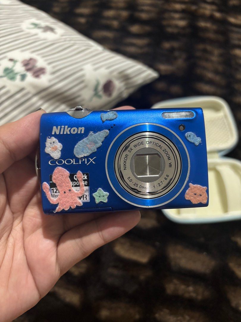 Nikon COOLPIX S5100 (Category: Cameras) located in Valenzuela. Submitted by hchiware (Listing ID 1413189809, Image 1). Description: Nikon Coolpix S5100 ₱4.5k+ sf - 5x wide optical zoom - 12 megapixel resolution - Screen displays distorted image - Need LCD replacement but does not affect output Inclusions: • Camera unit • Battery • SD card • Charger • Camera case • Card reader.