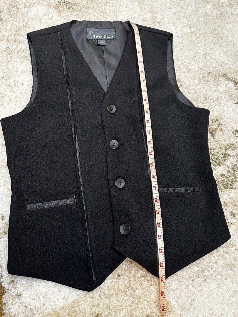 Onesimus Black Vest (Category: Vests) located in Manila. Submitted by karltrinidad (Listing ID 1413191798, Image 2). Description: - Onesimus black vest - V-neck design - Four-button closure - Faux leather trim on front and pockets - Satin-like lining - Measurements: - Length: 24 inches - Shoulders: 14 inches - Chest: 17 inches.