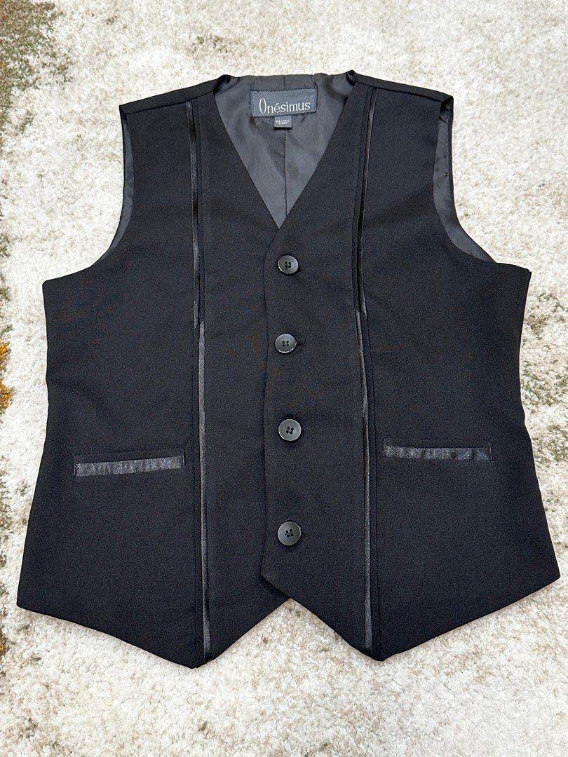 Onesimus Black Vest (Category: Vests) located in Manila. Submitted by karltrinidad (Listing ID 1413191798, Image 1). Description: - Onesimus black vest - V-neck design - Four-button closure - Faux leather trim on front and pockets - Satin-like lining - Measurements: - Length: 24 inches - Shoulders: 14 inches - Chest: 17 inches.