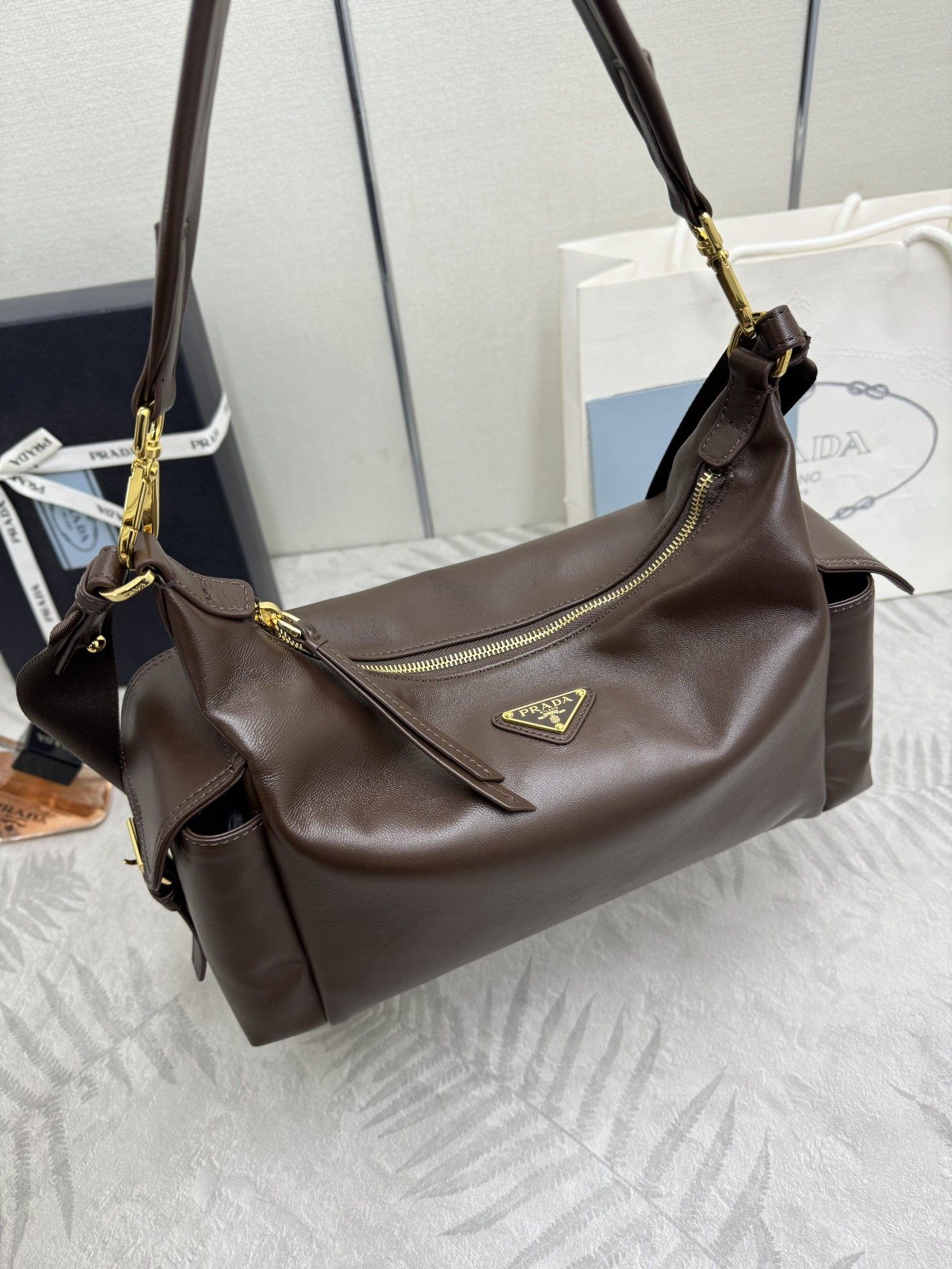 PRADA's new Explorer bag in a new coffee color for lambskin, 名牌, 手袋及銀包 ...