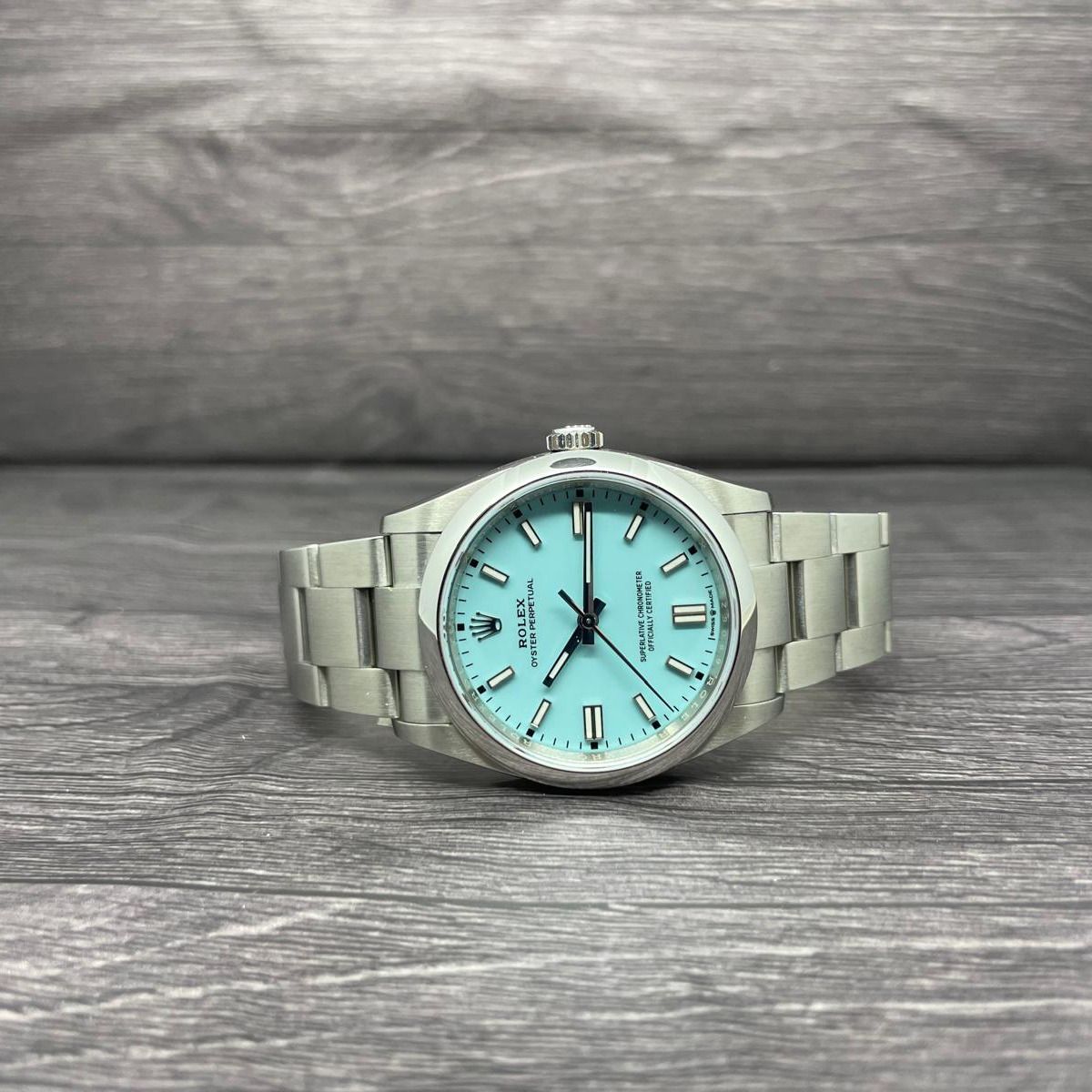 [Full Set] [2021] Rolex Oyster Perpetual Turquoise "Tiffany" 126000 [36mm] (Category: Watches) located in Singapore. Submitted by vsy07 (Listing ID 1413052843, Image 2). Description: Oyster Perpetual 126000 Turquoise "Tiffany" Worn a few times, in general good condition. Scratch at bezel that is visible under 3x+ loupe at 4pm, no other known damages/dents/etc. Probably hairline scratches at the buckles. Papers: Yes (2021 Set) Box: Yes Full set wi