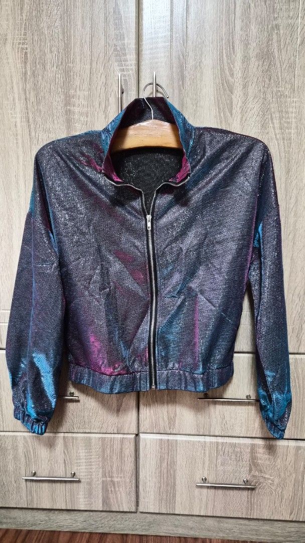 Shein Holographic Jacket - Size S (Category: Coats, Jackets and Outerwear) located in Bulacan. Submitted by getclaud (Listing ID 1413145873, Image 1). Description: Brand: Shein Holographic Bomber jacket Fabric is cotton polyester Small on tag but fits up to medium P200.00.