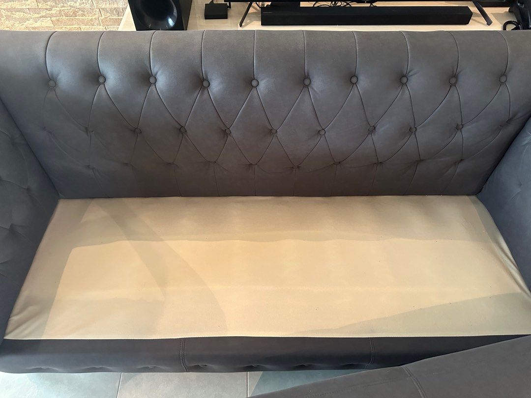 Sofa (Category: Sofas) located in Singapore. Submitted by bbbbbbbuuuuuu (Listing ID 1413064097, Image 3). Description: Chesterfield sofa in grey color Purchase it 2 years ago No scratches or stains on the sofa For more pictures , please direct chat with me Dimension ( L x B x H) 78ft x 30ft x 33 ft Not for fussy buyers Self arrangement of collection Bought it @ $1800 .