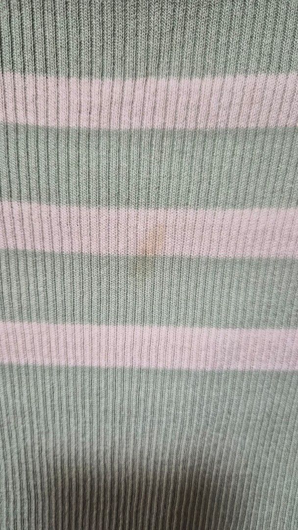 Striped Crop Top (Category: Sleeveless) located in Bulacan. Submitted by getclaud (Listing ID 1413144569, Image 3). Description: Waffle top turtle neck Freesize but fits small to semi large Bought from Tiktok Available in Brown and Green (green with small stain in front) P150.00 - get 1 or P280 for both.