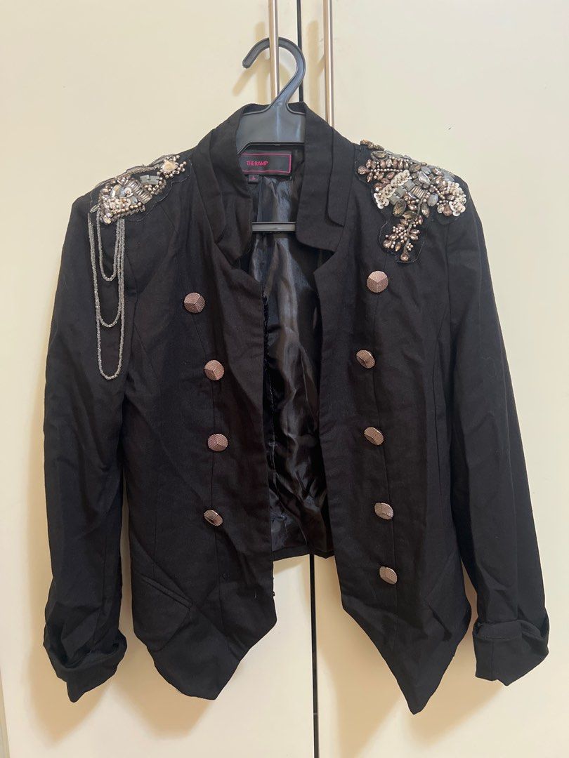 The Ramp Black Embellished Jacket (Category: Coats, Jackets and Outerwear) located in Manila. Submitted by project40 (Listing ID 1413050778, Image 1). Description: - The Ramp black jacket - Embellished shoulder details - Silver button design (missing 1 button on left) - Features a satin lining - Unique cut and design - Folded cuff sleeves - L on tag but fits XS to S as it meant to be like a rockstar blazer 😊 - Meant not to be buttoned, only as a