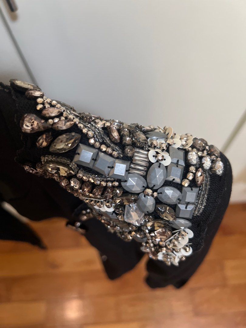 The Ramp Black Embellished Jacket (Category: Coats, Jackets and Outerwear) located in Manila. Submitted by project40 (Listing ID 1413050778, Image 2). Description: - The Ramp black jacket - Embellished shoulder details - Silver button design (missing 1 button on left) - Features a satin lining - Unique cut and design - Folded cuff sleeves - L on tag but fits XS to S as it meant to be like a rockstar blazer 😊 - Meant not to be buttoned, only as a
