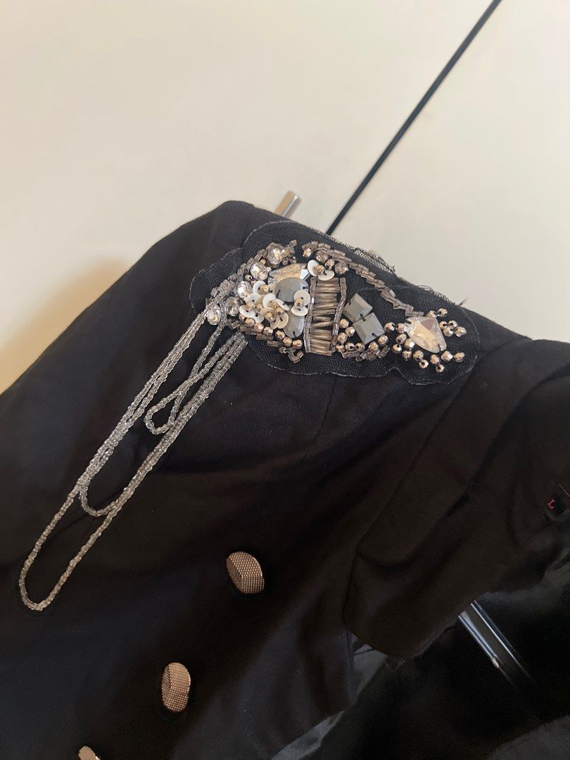 The Ramp Black Embellished Jacket (Category: Coats, Jackets and Outerwear) located in Manila. Submitted by project40 (Listing ID 1413050778, Image 3). Description: - The Ramp black jacket - Embellished shoulder details - Silver button design (missing 1 button on left) - Features a satin lining - Unique cut and design - Folded cuff sleeves - L on tag but fits XS to S as it meant to be like a rockstar blazer 😊 - Meant not to be buttoned, only as a