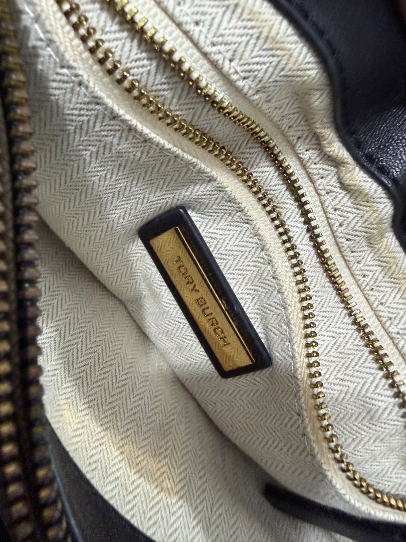 Tory Burch Black Quilted Shoulder Bag (Category: Luxury Bags & Wallets) located in Caloocan City. Submitted by claudiaccc1 (Listing ID 1413221830, Image 3). Description: Authentic Black quilted shoulder bag Gold-tone chain straps and hardware Shows some wear on hardware RFS decluttering Bought online.