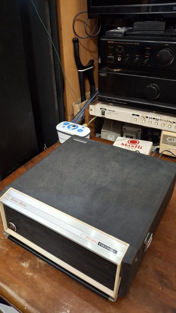 Turntable Columbia Solid State Record Player 2190RM (Category: Soundbars, Speakers & Amplifiers) located in Quezon City. Submitted by mg.q.m (Listing ID 1413122955, Image 1). Description: - Vintage Columbia Solid State record player - Model: 2190RM - Stylish black exterior with silver 1 accents - Features a built-in turntable - Includes volume and tone controls - Portable design with a convenient handle 100V japan add 1k for 220v stepdown transfo
