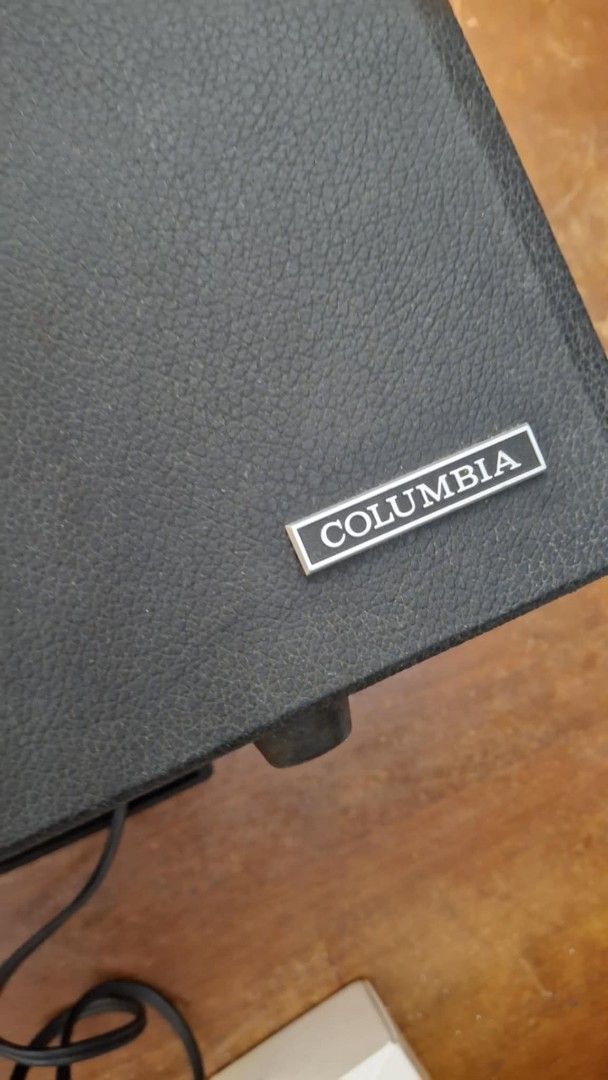 Turntable Columbia Solid State Record Player 2190RM (Category: Soundbars, Speakers & Amplifiers) located in Quezon City. Submitted by mg.q.m (Listing ID 1413122955, Image 2). Description: - Vintage Columbia Solid State record player - Model: 2190RM - Stylish black exterior with silver 1 accents - Features a built-in turntable - Includes volume and tone controls - Portable design with a convenient handle 100V japan add 1k for 220v stepdown transfo