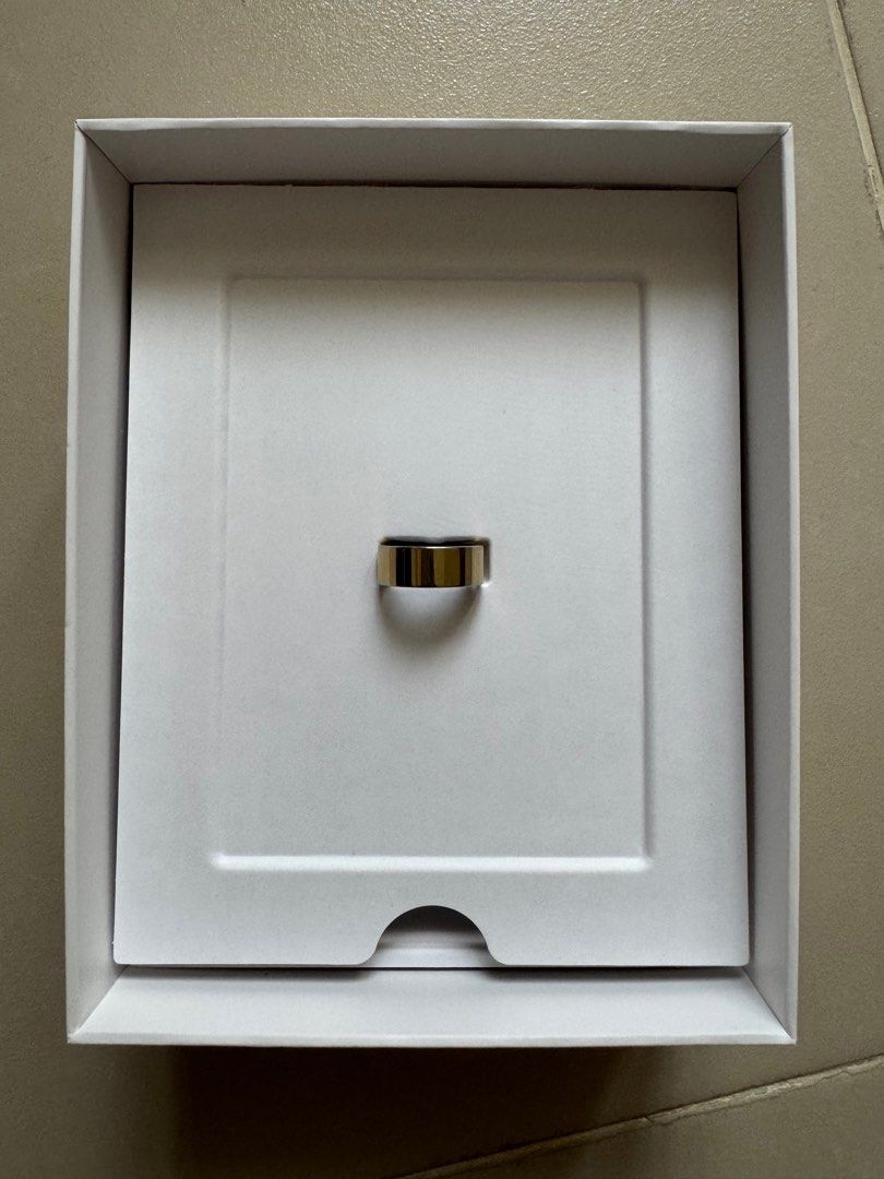 Ultrahuman Ring Air Bionic Gold (Size 6) (Category: Wearables & Smart Watches) located in Pasig City. Submitted by bnc511 (Listing ID 1413068234, Image 1). Description: - Ultrahuman Ring Air (Gold) - Size 6 - Bionic Gold - Smart ring for sleep, recovery, and movement tracking. - Includes original packaging, charger, and charging cord (USB C). Bought this mid-July 2025 so it’s around 5-6 months old. ‼️ Selling at more than 50% off given that it ha
