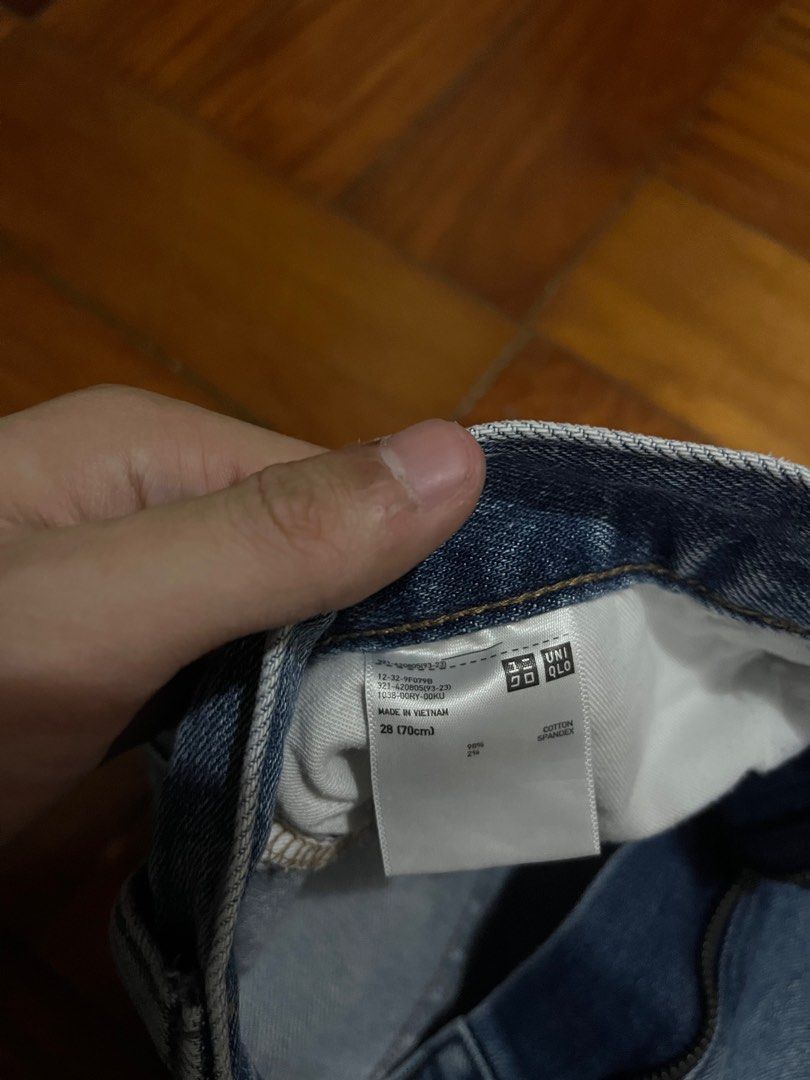 Uniqlo Distressed Jeans - Size 28 (Category: Jeans) located in Bacoor. Submitted by pastforward.ph (Listing ID 1413130328, Image 2). Description: - Uniqlo jeans - Light blue wash - Distressed detailing - Size 28 (70cm) - Made in Vietnam - Minor wear and tear, some stains - Classic five-pocket design - Button and zipper closure.