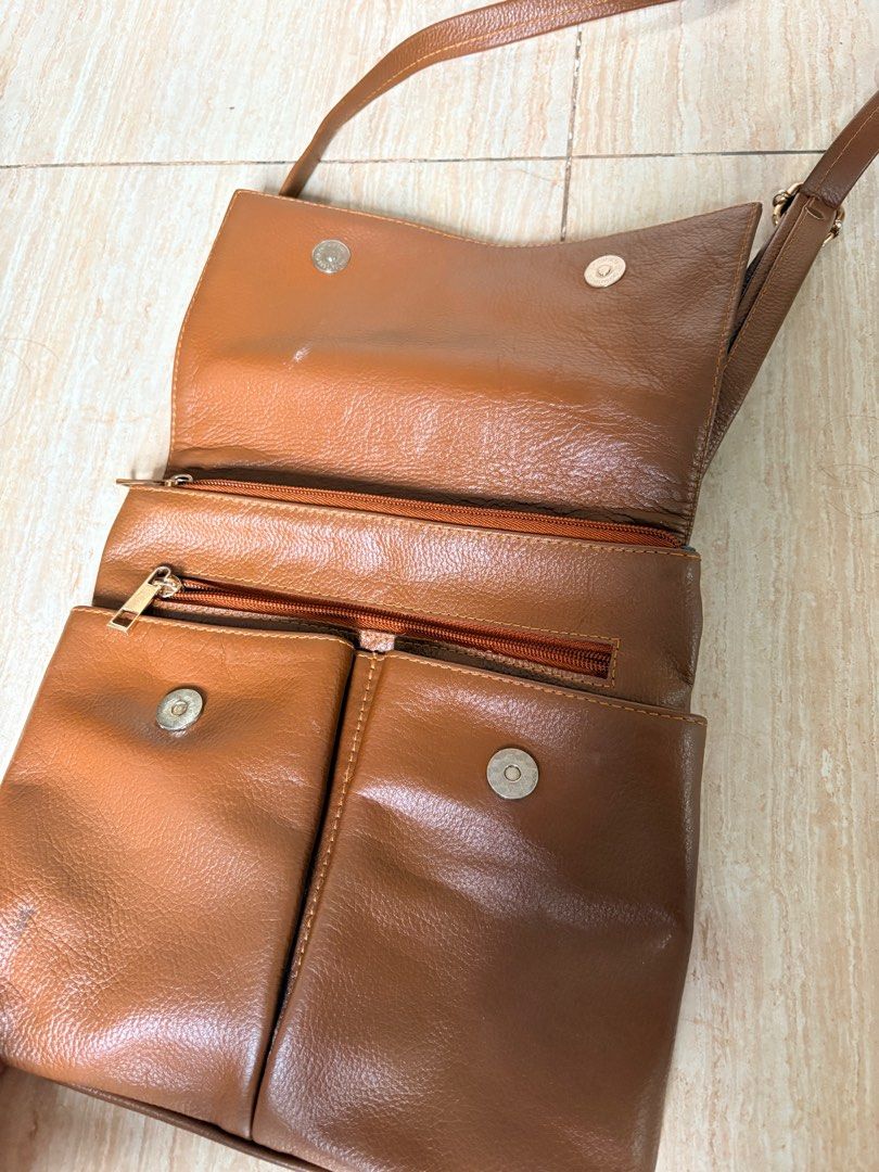 Vedasto Brown Genuine Leather Sling Bag (Category: Cross-body Bags) located in Taguig. Submitted by armih007 (Listing ID 1413063061, Image 2). Description: - unisex - brown genuine leather - with sign of usage but in good condition.