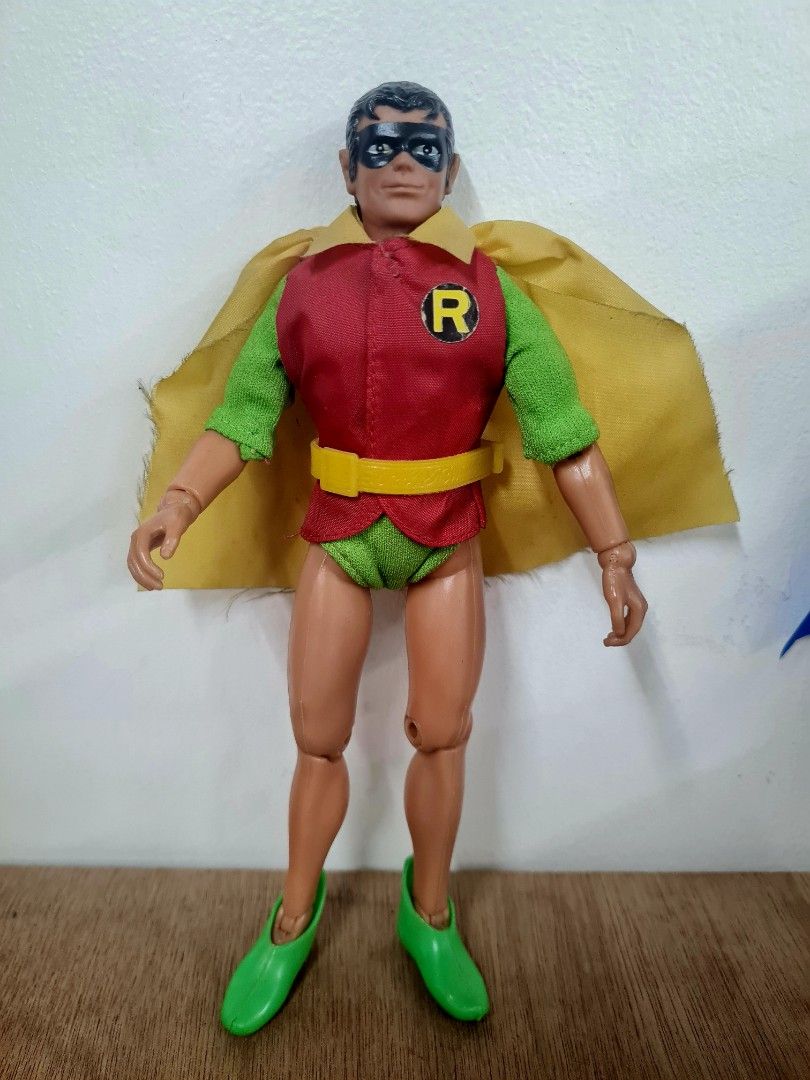 Vintage (Mego) Batman and Robin Action Figures (Category: Figurines & Statues) located in Quezon City. Submitted by lobaman (Listing ID 1413149897, Image 3). Description: - Vintage Batman and Robin figures - Batman: Grey and black suit, blue cape - Robin: Red and green outfit, yellow cape - Fabric capes - MEGO brand c1974 - 8" tall - Detailed costumes - Great for collectors!.