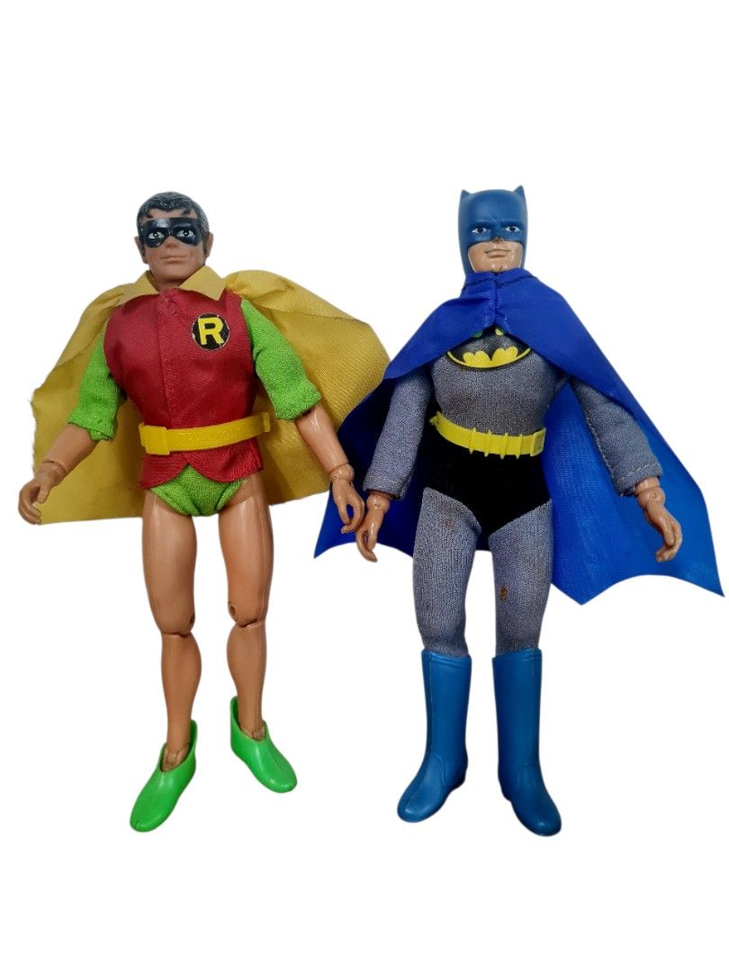 Vintage (Mego) Batman and Robin Action Figures (Category: Figurines & Statues) located in Quezon City. Submitted by lobaman (Listing ID 1413149897, Image 2). Description: - Vintage Batman and Robin figures - Batman: Grey and black suit, blue cape - Robin: Red and green outfit, yellow cape - Fabric capes - MEGO brand c1974 - 8" tall - Detailed costumes - Great for collectors!.