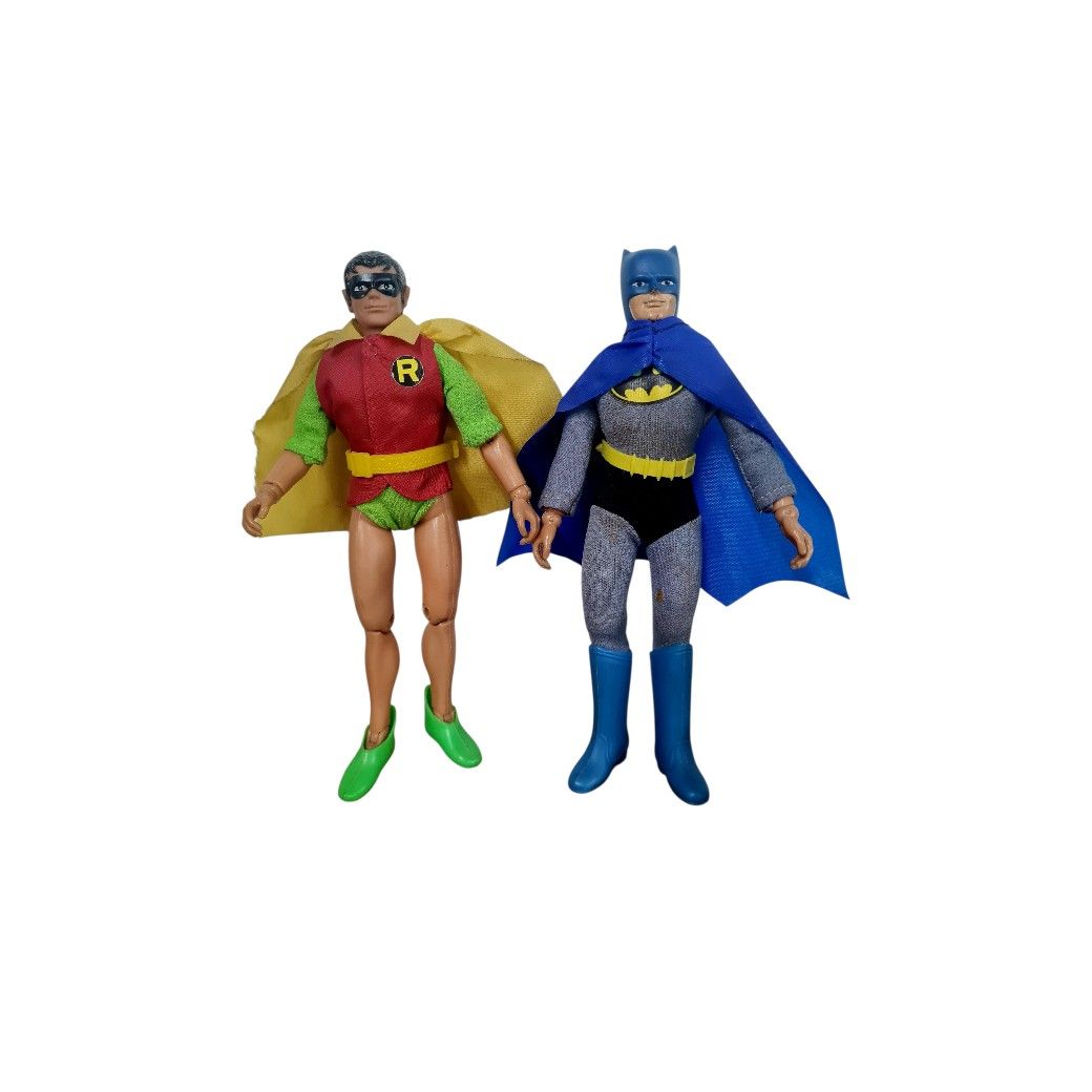 Vintage (Mego) Batman and Robin Action Figures (Category: Figurines & Statues) located in Quezon City. Submitted by lobaman (Listing ID 1413149897, Image 1). Description: - Vintage Batman and Robin figures - Batman: Grey and black suit, blue cape - Robin: Red and green outfit, yellow cape - Fabric capes - MEGO brand c1974 - 8" tall - Detailed costumes - Great for collectors!.