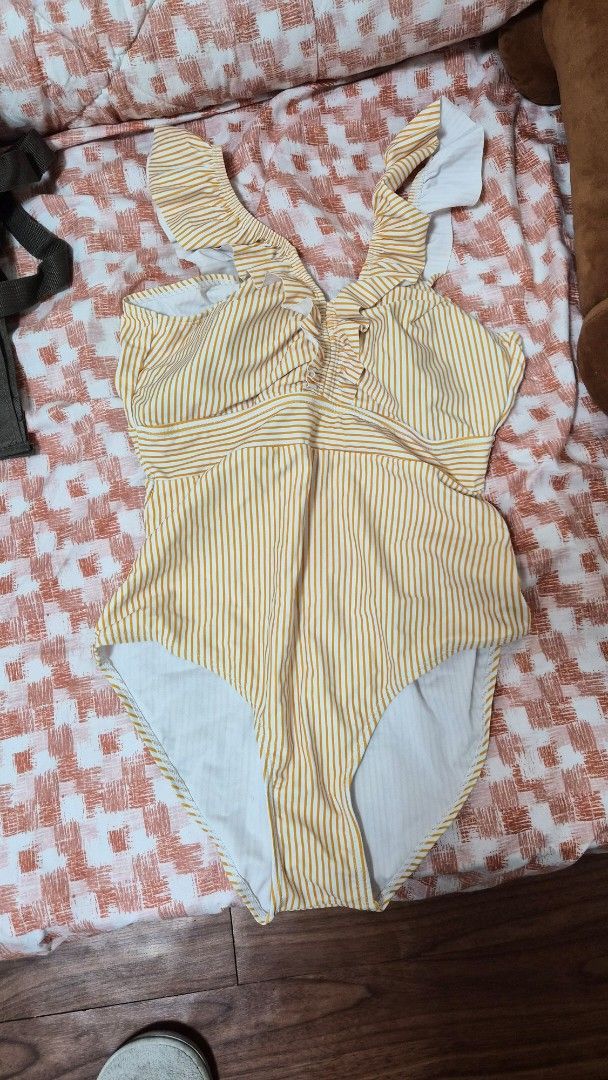 Yellow Striped Swimsuit - Size S (Category: Bikinis & Swimsuits) located in Bulacan. Submitted by getclaud (Listing ID 1413143384, Image 1). Description: One-piece swimsuit with raffles sleeves Once used Bought from orange app With pads Small on tag - fits small to medium P150.00.